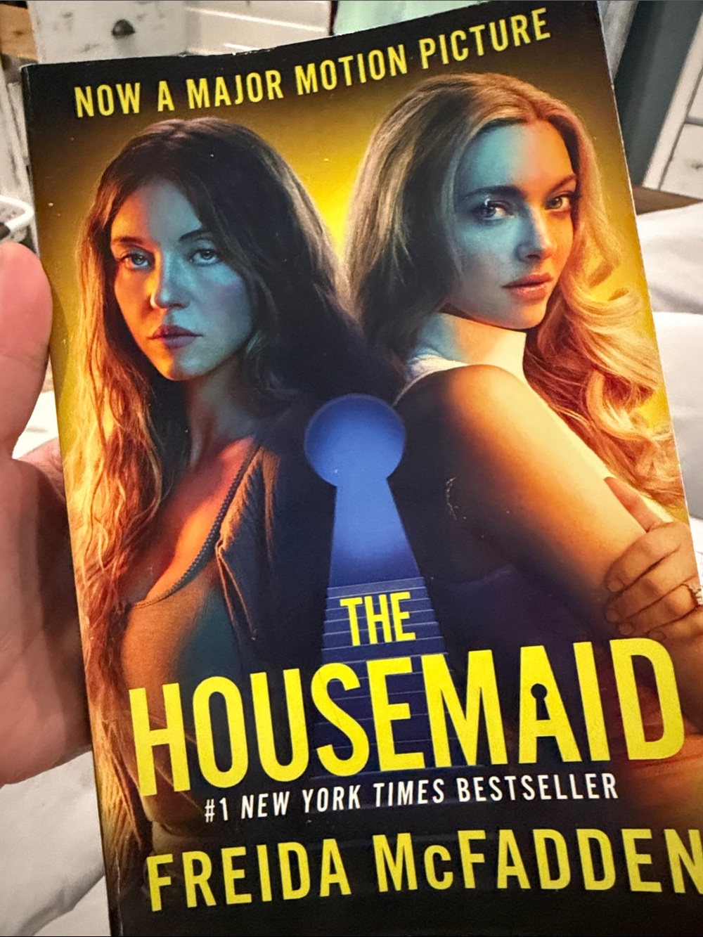 The Housemaid by Freida McFadden - Yellow & Blue Paperback Novel